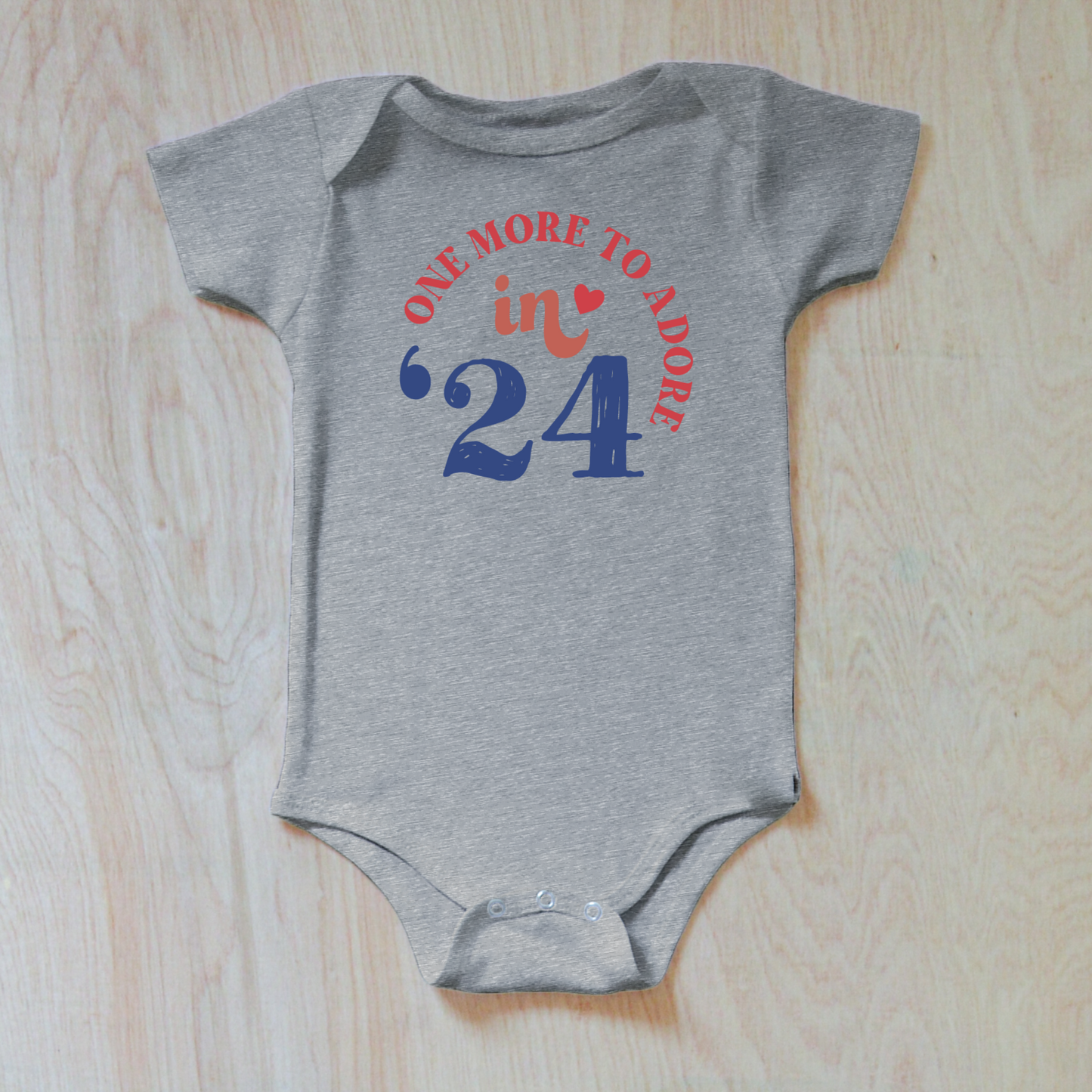 "One More to Adore" Baby Announcement Onesie