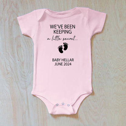 We've Been Keeping a Little Secret Baby Announcement Onesie with Personalized Last Name and Due Date