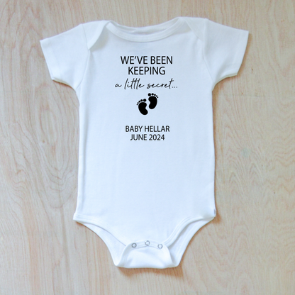 We've Been Keeping a Little Secret Baby Announcement Onesie with Personalized Last Name and Due Date